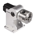 A silver-colored three-jaw rotary axis attachment with a scale dial, intended for use with fiber engravers.